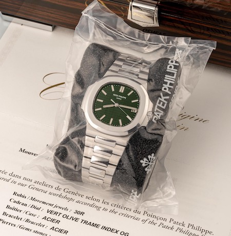 green dial Patek shrink wrapped